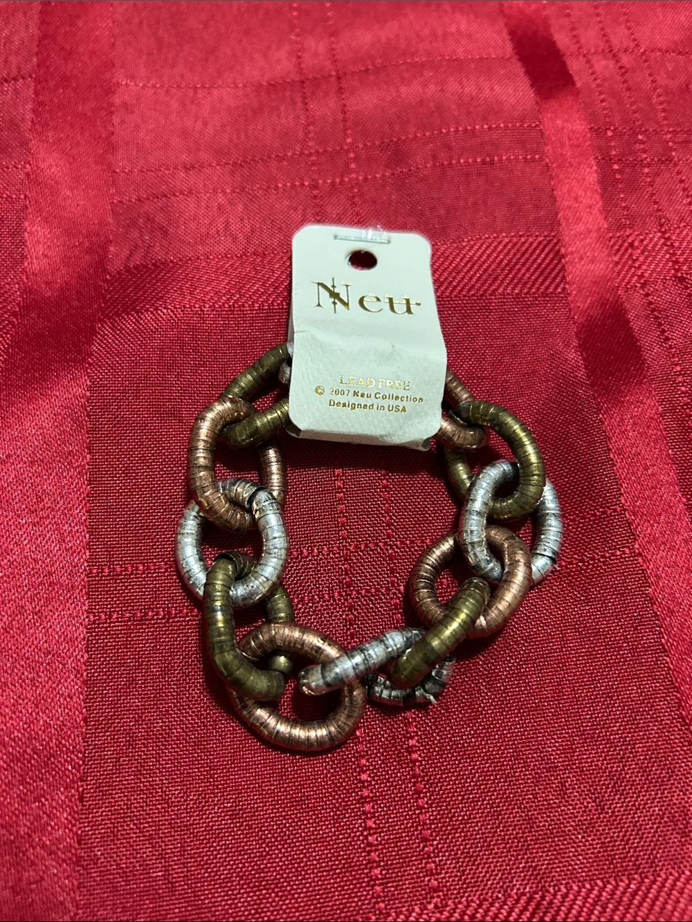 Home Collection Multi-Tone Metallic Link Bracelet in Gold, Bronze, and Silver